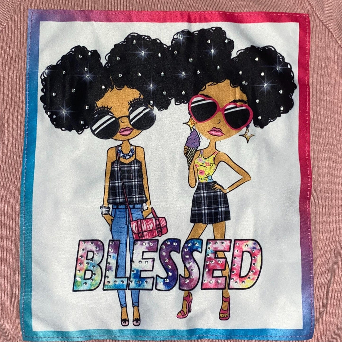 Get ready for fall in this cozy legging set. This set features a dusty rose colored top with a screen pressed "Blessed" design and black and white plaid leggings.