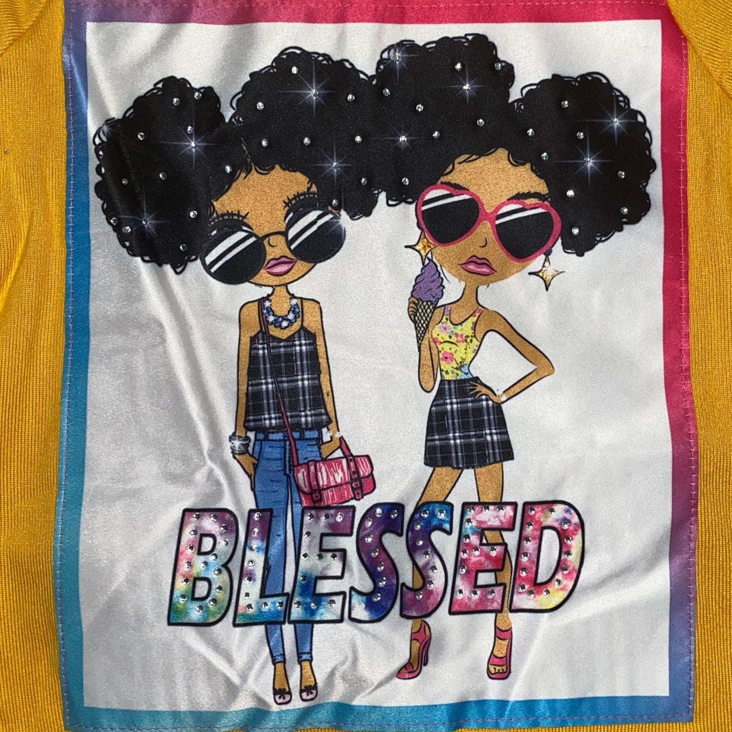 Get ready for fall in this cozy legging set. This set features a mustard colored top with a screen pressed "Blessed" design and black and white plaid leggings.