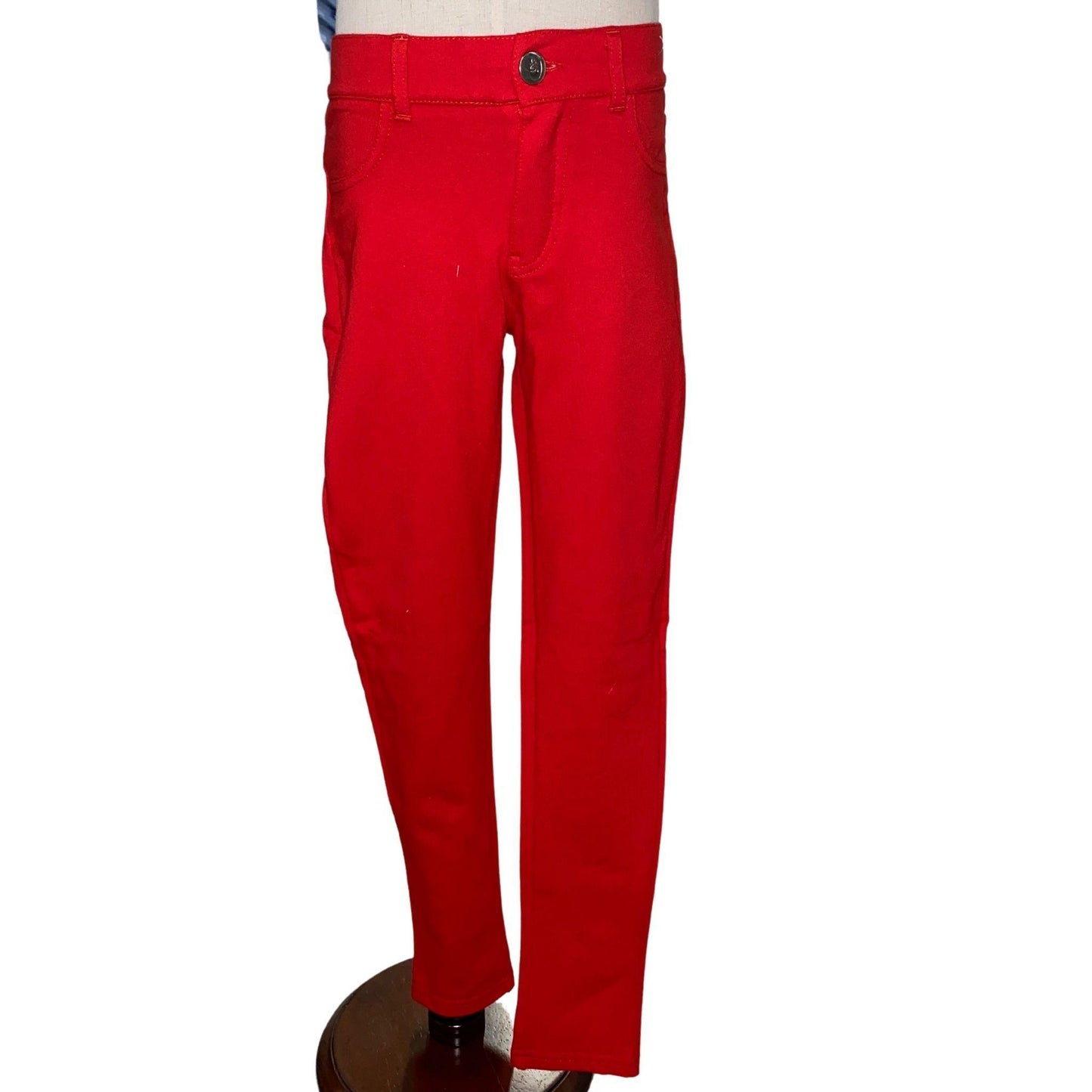 These comfortable, stretchy, red jeggings are a perfect addition to your little diva's wardrobe.  This style features a button closure and pockets on the back.
