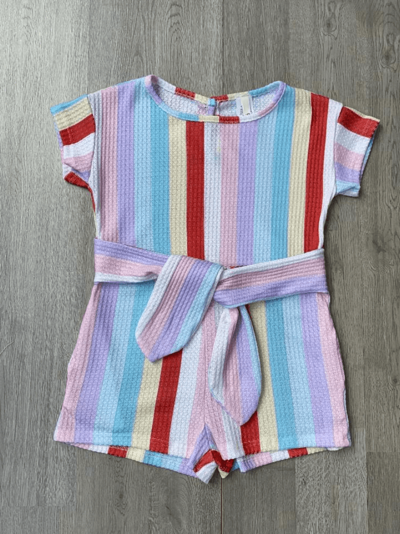 It's time to play in this striped waffle romper featuring a waist tie and pockets.  This comfortable romper is perfect for playtime or a day on the town!