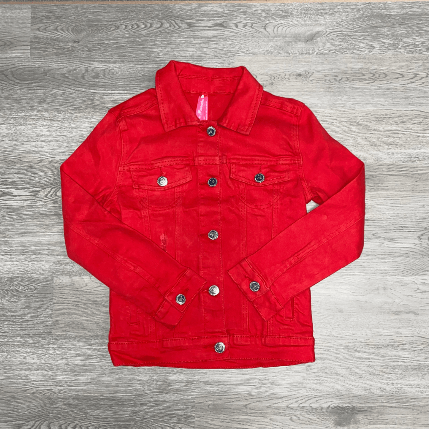 Your little one can showcase her inner diva in this red denim jacket.  This button down jacket is the perfect addition to any wardrobe.